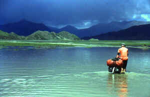 Albert negotiating the roadconditions in Tibet, 1999.