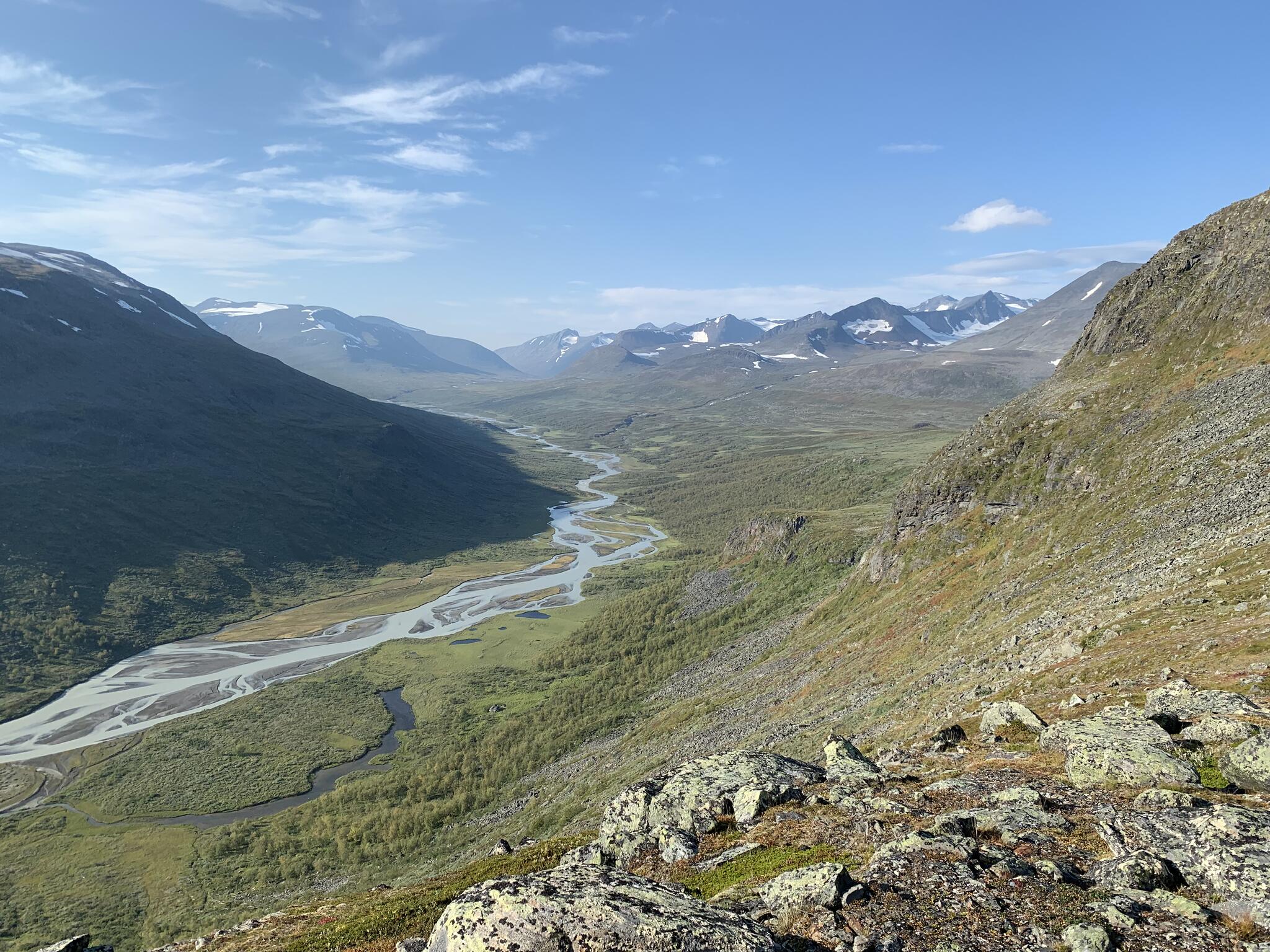 The upper Rapadalen and Skarja seen from Snavvavagge.  The path passes just below the cliff on the right.