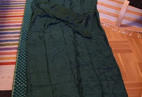 Bilder på sovsäckslakan